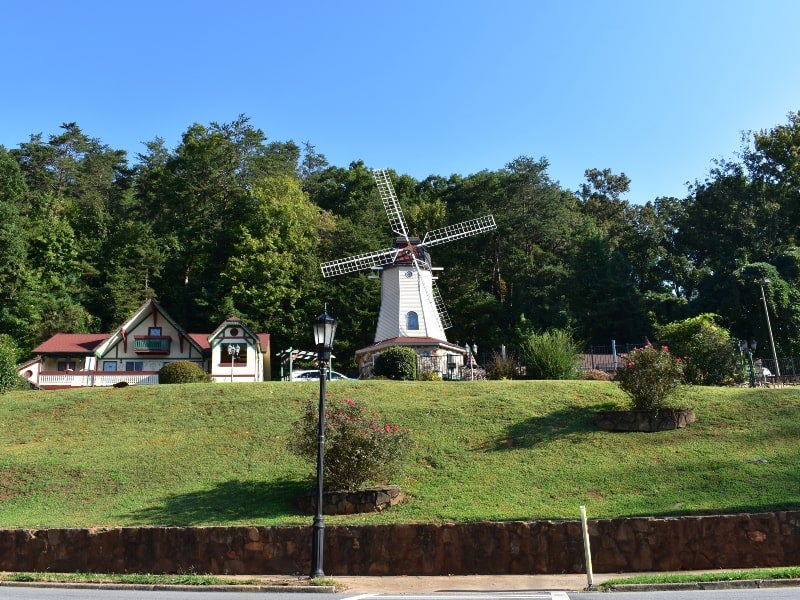 Historic windmill and Bavarian buildings on Helen, GA street